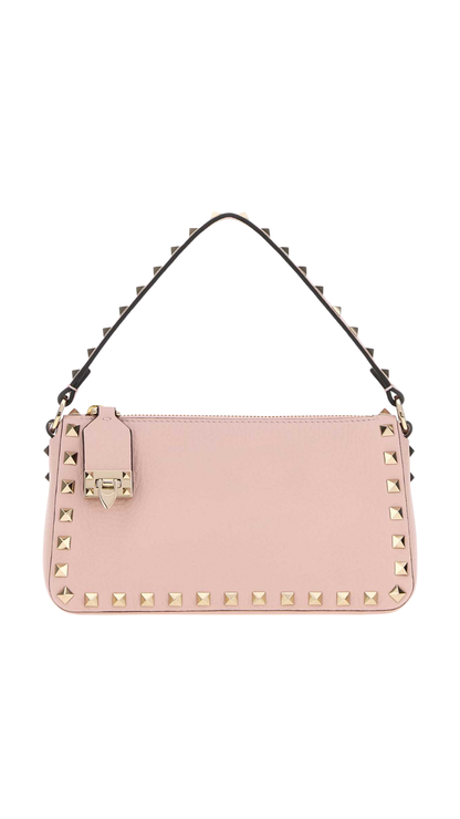 Small Rockstud Grainy Calfskin Crossbody Bag in Pink