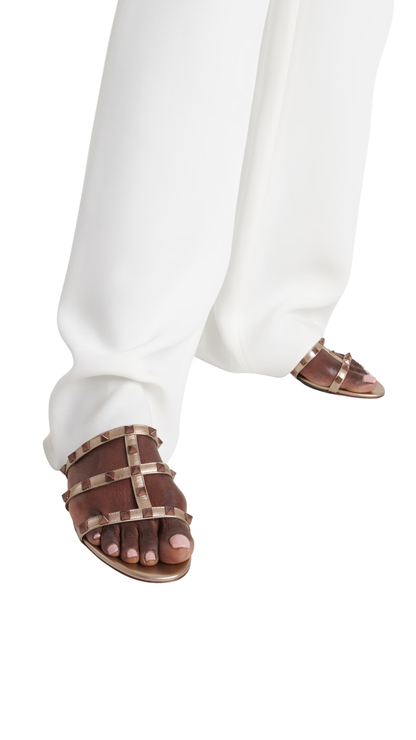 Rockstud Leather Sandals in Gold Metallic