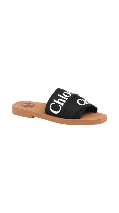 Mule plana Woody en negro