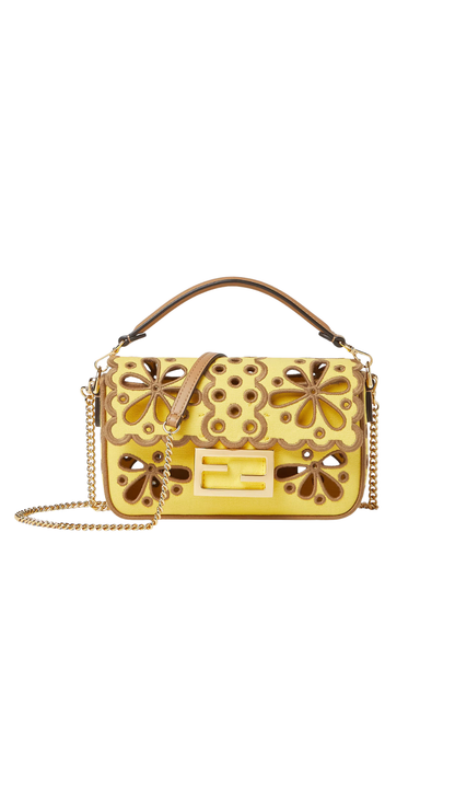 Baguette® Mini en lona Broom Yellow con motivo floral calado